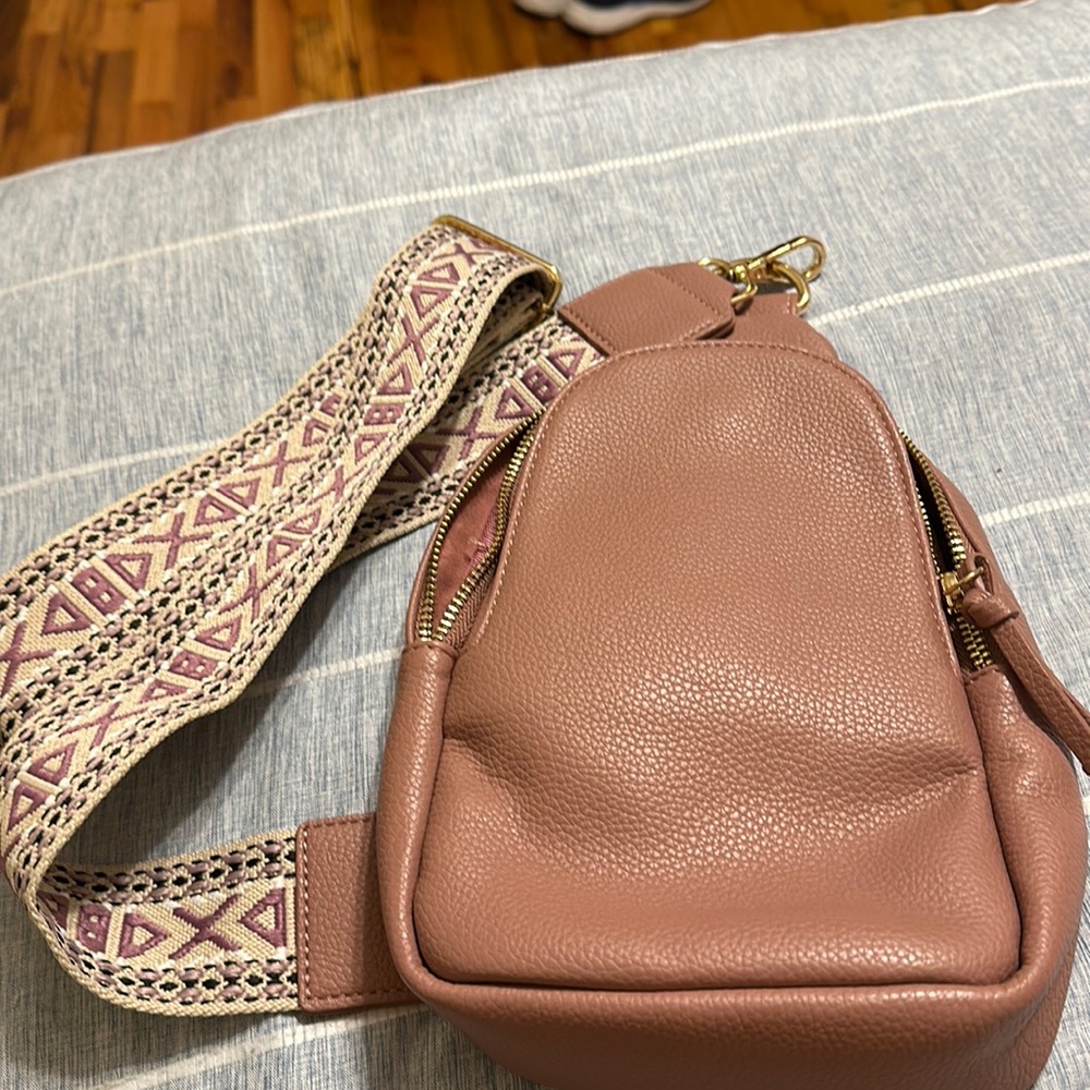 Ah Dorned pink crossbody bag with patterned handle